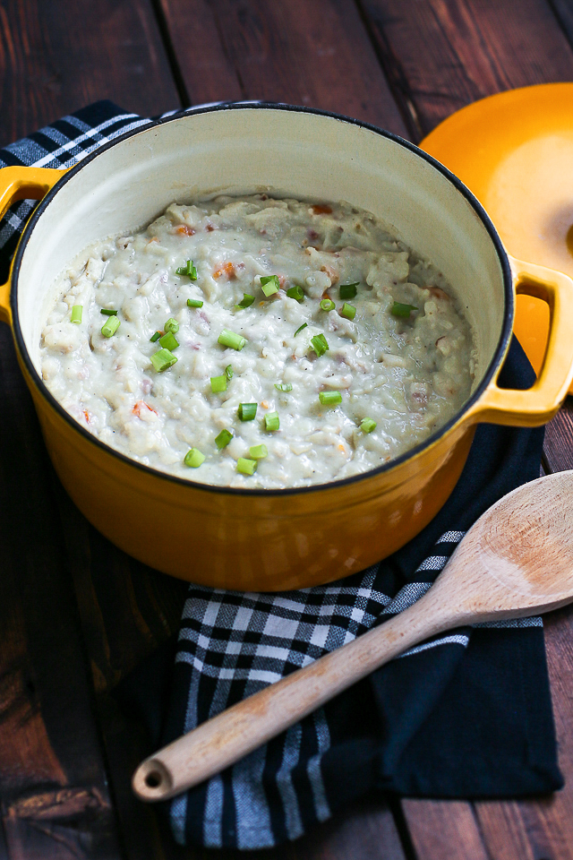 paleo baked potato soup with wooden spoon